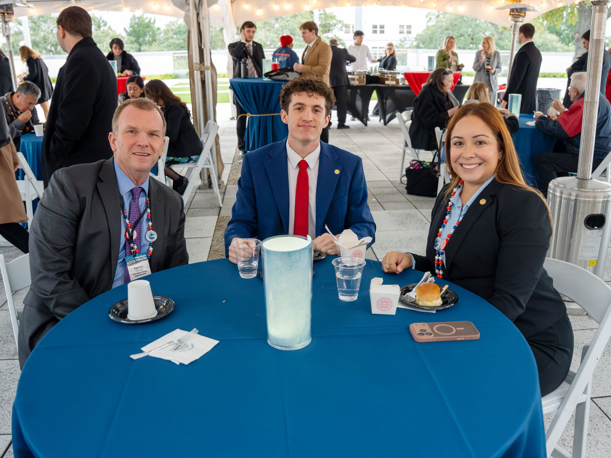 PBC Deputy County Administrator Patrick Rutter with District 6’s Kayla West and Dylan Kimberly.