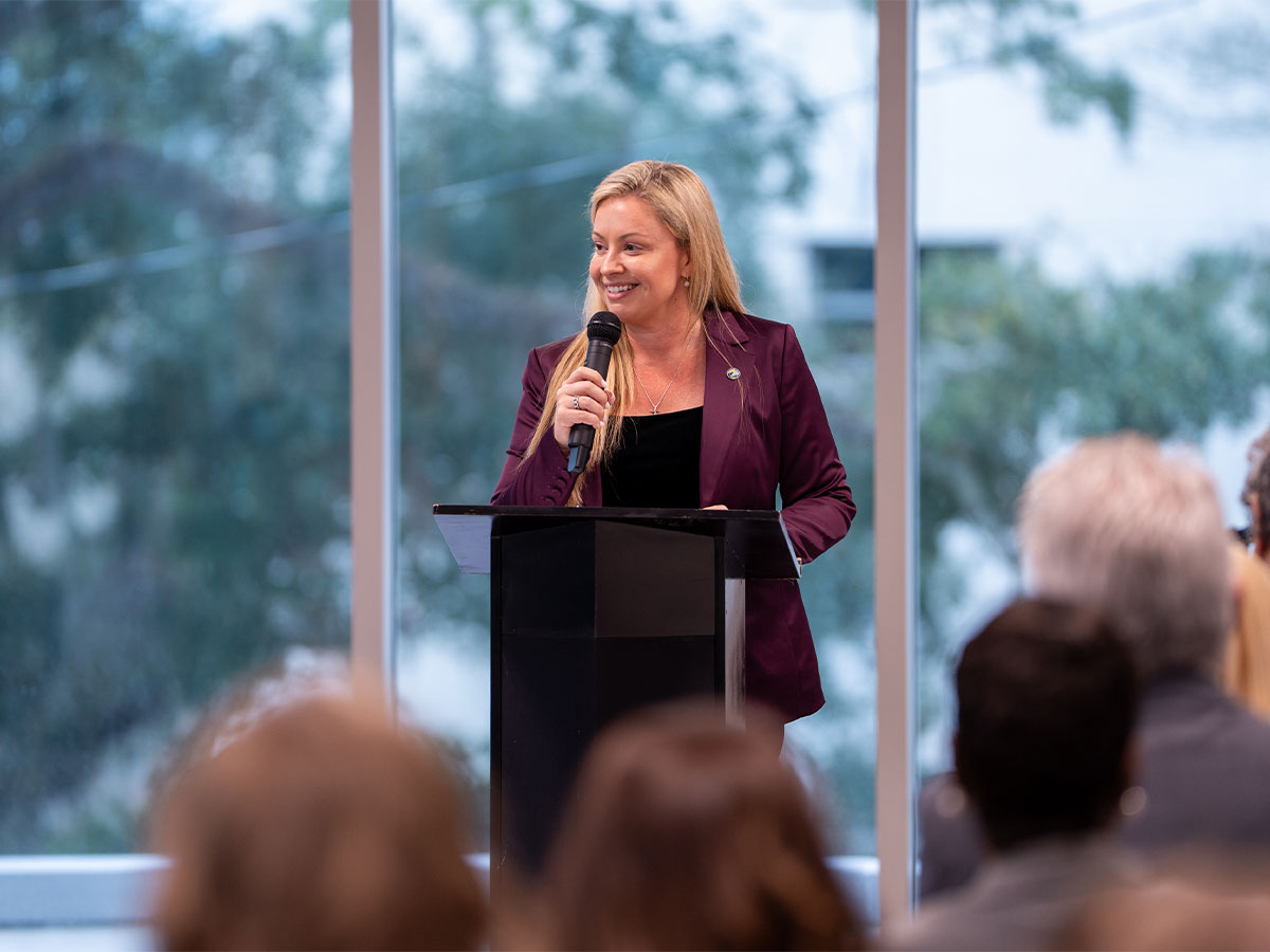 PBC Mayor Sara Baxter addresses the Speaker's Forum.