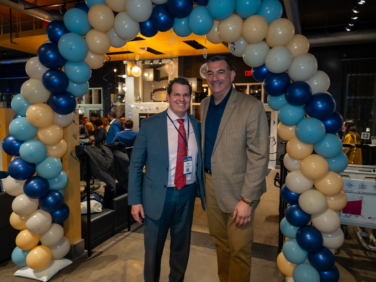 Former PBC Chief Deputy County Administrator Todd Bonlarron and Discover’s Sergio Piedra.